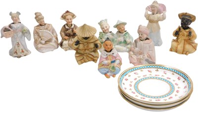 Lot 631 - Nine late 19thC Continental porcelain nodding...