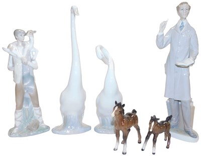Lot 637 - A Lladro porcelain figure of a man, modelled...