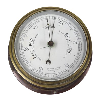 Lot 592 - A Sestrel brass cased barometer, 20cm wide.