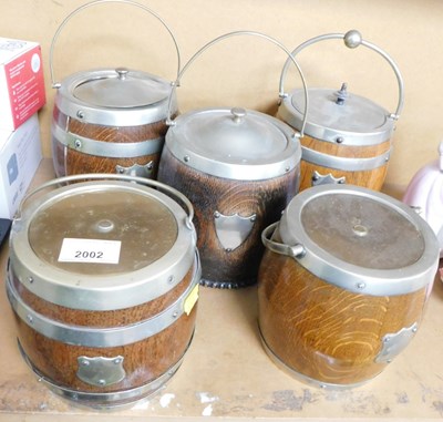 Lot 2002 - Five oak biscuit barrels, each with plated...
