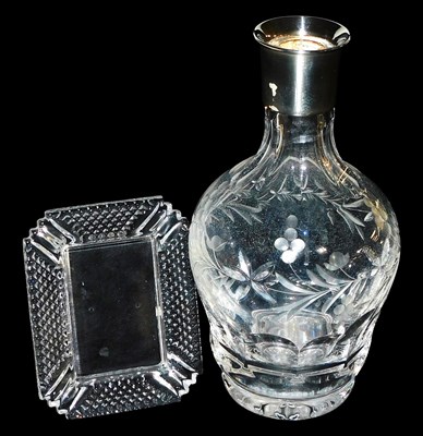 Lot 597 - A cut glass decanter, with silver collar,...