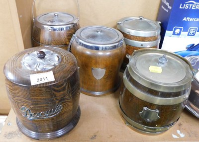 Lot 2011 - Five oak biscuit barrels, some with plated...