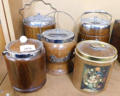 Lot 2016 - Five oak and other biscuit barrels, some with...