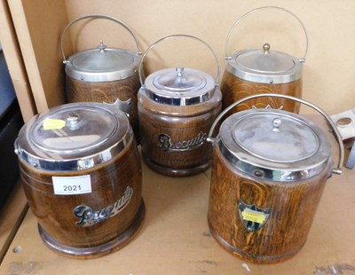Lot 2021 - Five oak biscuit barrels, each with metal mounts.