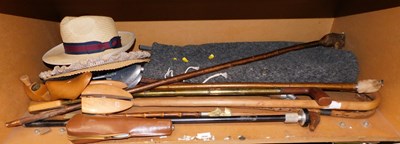 Lot 2046 - A group of walking sticks, straw hat, Church's...