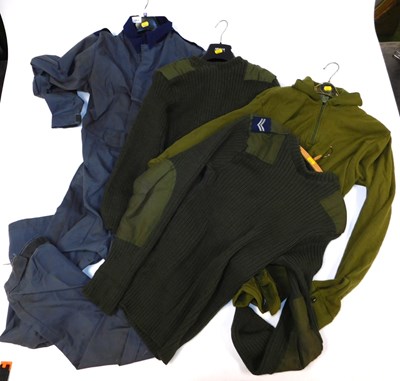 Lot 2064 - A group of clothing, to include two green...