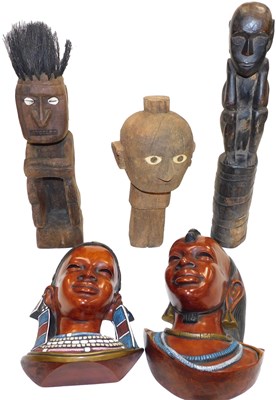 Lot 619 - A Sulawesi carved wooden tao tao head, 33cm...