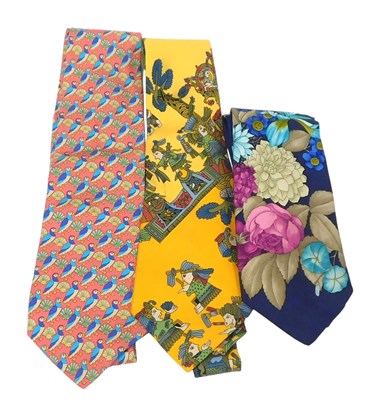 Lot 653 - An Hermes yellow Aztec pattern silk tie,...