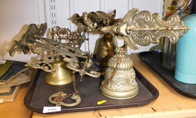 Lot 2103 - Four brass wall mounted bells.