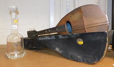 Lot 2081 - A mandolin, in partial case, together with a...