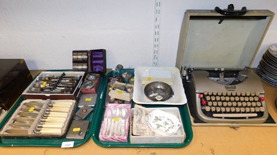 Lot 2127 - A cased Oliver Courier typewriter, together...