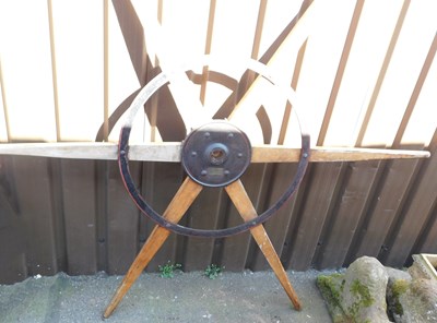 Lot 670 - A late 19thC wooden and cast iron water wheel,...