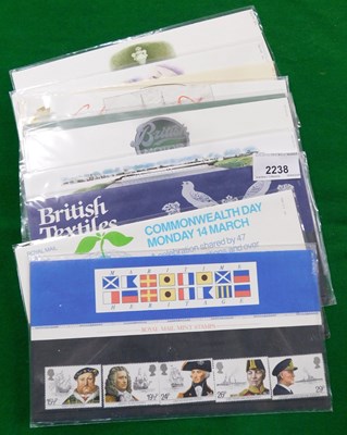 Lot 2238 - A group of Royal Mail stamp presentation packs,...