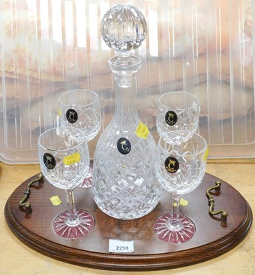 Lot 2250 - A lead crystal decanter, together with four...
