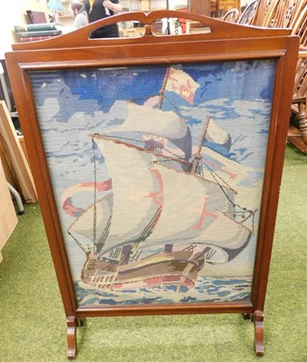 Lot 2267 - An Edwardian mahogany framed fire screen, with...
