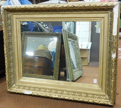Lot 2278 - A gilt wood and gesso wall mirror, decorated...