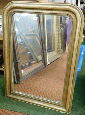 Lot 2280 - A gilt wood wall mirror, of rectangular form...