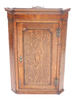 Lot 715 - A George III oak and mahogany hanging corner...