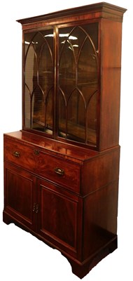 Lot 683 - A George III mahogany secretaire bookcase,...