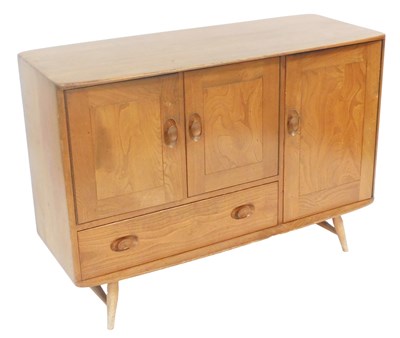 Lot 739 - An Ercol light elm sideboard, with two...