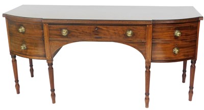 Lot 690 - A George III mahogany break front sideboard,...