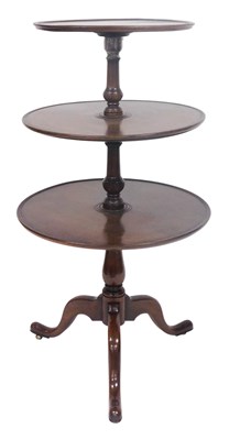 Lot 691 - A George III mahogany three tier dumb waiter,...