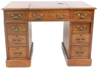 Lot 697 - A Victorian oak twin pedestal desk, with a...
