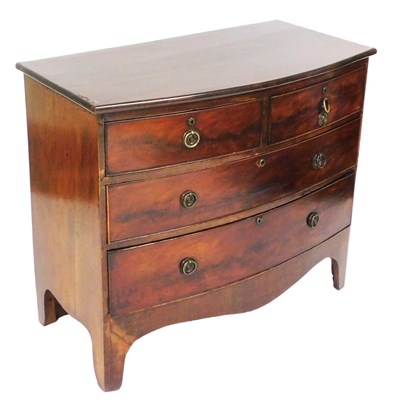 Lot 702 - A George III mahogany bow front chest, of two...
