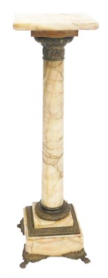 Lot 705 - A Victorian marble and brass torchere stand,...
