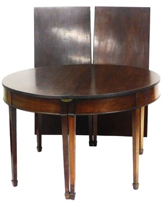 Lot 713 - A George III mahogany D-end dining table, with...