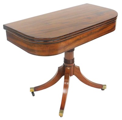 Lot 751 - A late Georgian mahogany D-shape fold over tea...