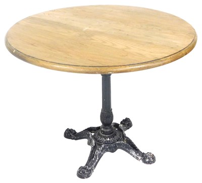 Lot 756 - A Victorian oak and cast iron circular table,...