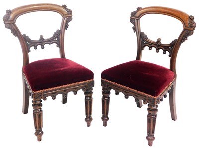 Lot 757 - A pair of Victorian Gothic oak dining chairs,...
