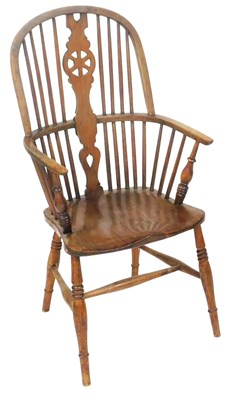Lot 759 - A 19thC beech and elm wheel back Windsor chair,...