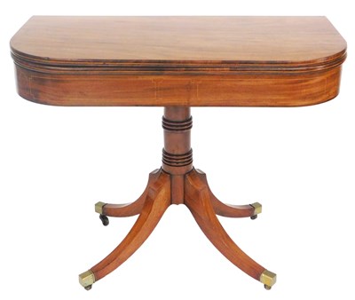 Lot 765 - A late Georgian mahogany fold over tea table,...