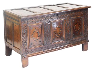 Lot 770 - A 17thC oak coffer, with a four panel lid, the...