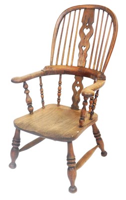 Lot 523 - A Victorian oak and elm Windsor chair, the...