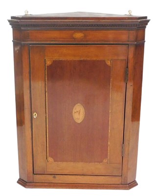 Lot 816 - A George III mahogany wall-hanging corner...
