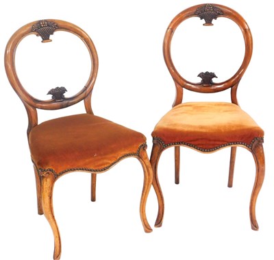 Lot 817 - A pair of Victorian mahogany balloon back...
