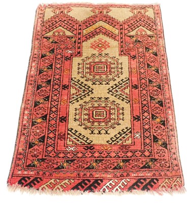 Lot 821 - A Caucasian red ground prayer rug, the mihrab...