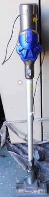 Lot 1007 - A Dyson cordless upright vacuum cleaner, with...