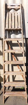 Lot 1012 - A wooden A frame step ladder. Buyer Note: VAT...