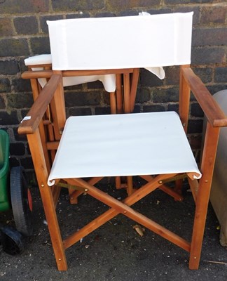 Lot 1025 - Two teak director's chairs.