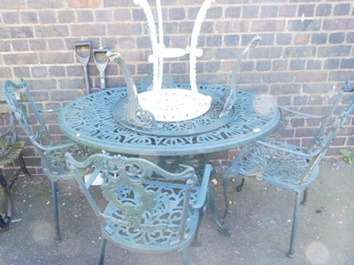 Lot 1029 - A green painted aluminium garden set,...