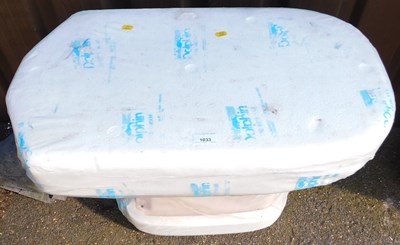Lot 1175 - A ceramic toilet cistern, in dolphin shrink wrap.