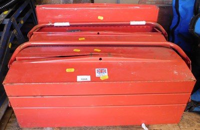 Lot 1044 - Two red metal cantilever toolboxes.