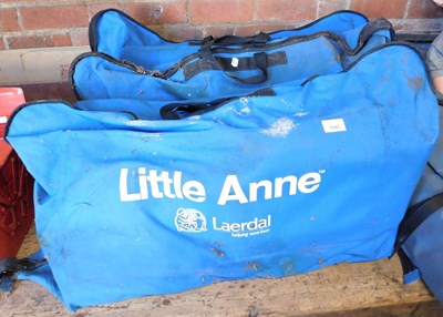 Lot 1045 - Three Laerdal Little Ann CPR medical training...