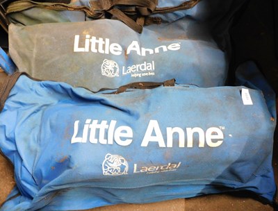 Lot 1058 - Two Laerdal Little Ann CPR mannequins, in...