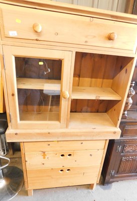 Lot 1074 - A pine cabinet, the top with a moulded edge...
