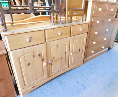 Lot 1082 - A pine chest of two short over four long...